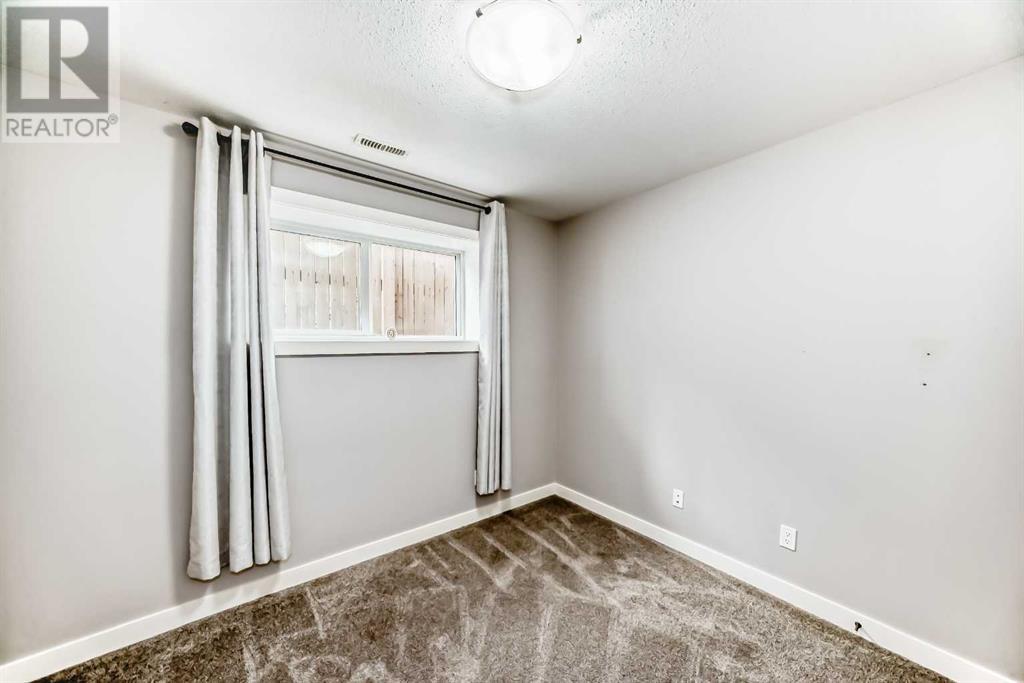 612 Aquitania Boulevard W, Lethbridge, Alberta  T1J 5G5 - Photo 21 - A2230894