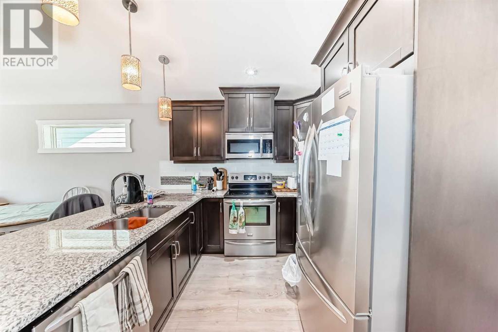 612 Aquitania Boulevard W, Lethbridge, Alberta  T1J 5G5 - Photo 5 - A2230894