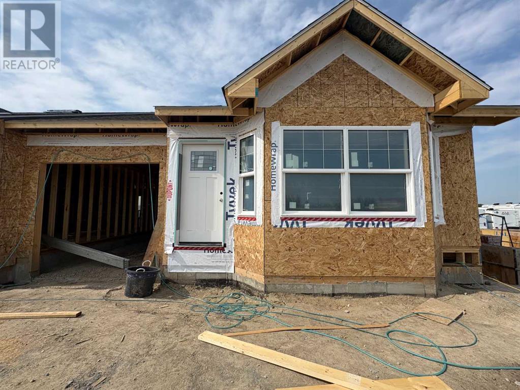 419 Meadowlark Way, Vulcan, Alberta  T0L 2B0 - Photo 3 - A2228029