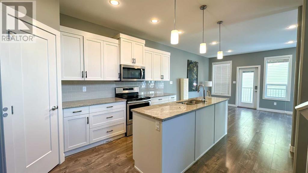 602 Bluebell Bay W, Lethbridge, Alberta  T1J 5S5 - Photo 4 - A2236707
