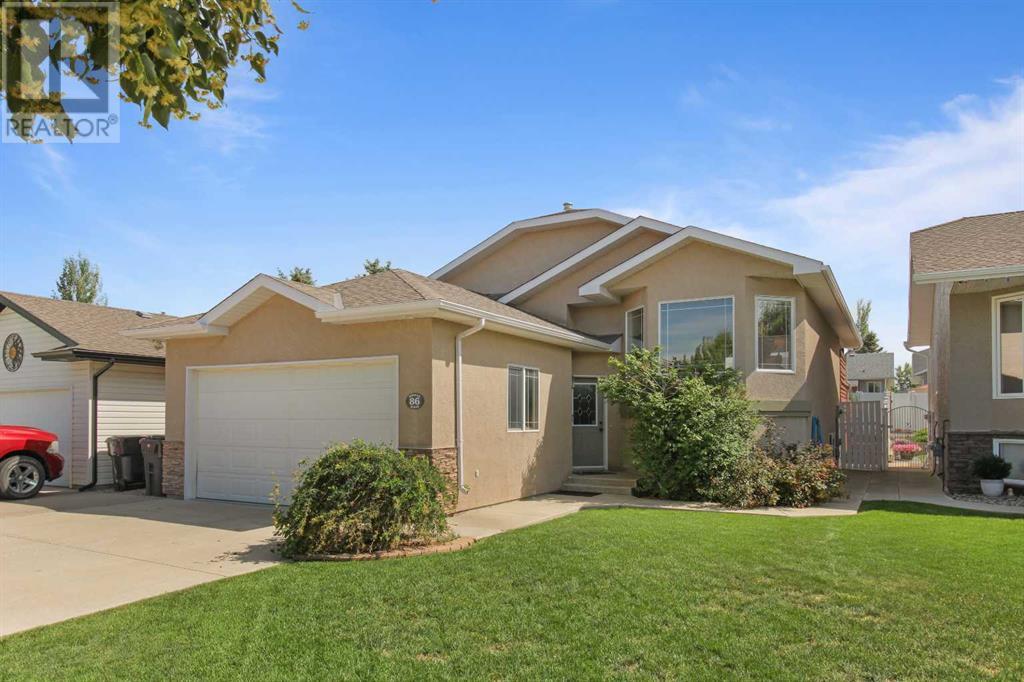 86 Heritage Boulevard W, Lethbridge, Alberta  T1K 6R9 - Photo 2 - A2237590