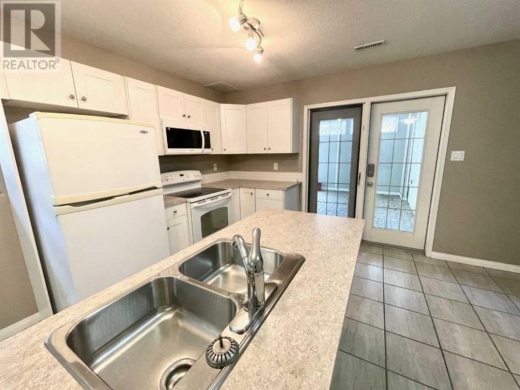 183 Cowichan Court W, Lethbridge, Alberta  T1K 7T7 - Photo 23 - A2238977