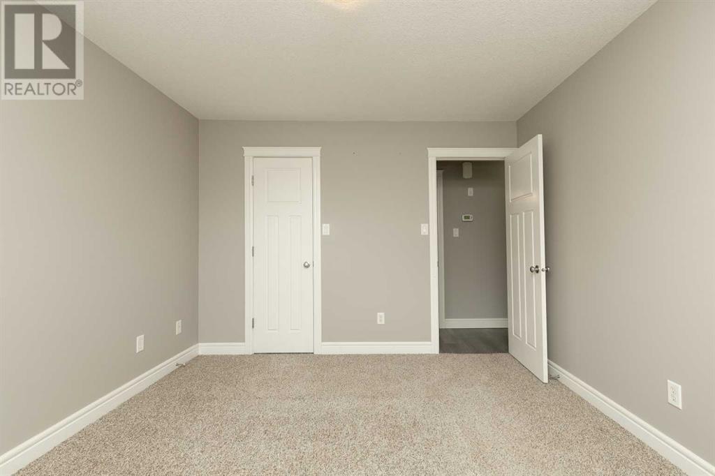 6, 893 Mt Sundance Manor W, Lethbridge, Alberta  T1J 1X7 - Photo 13 - A2237258