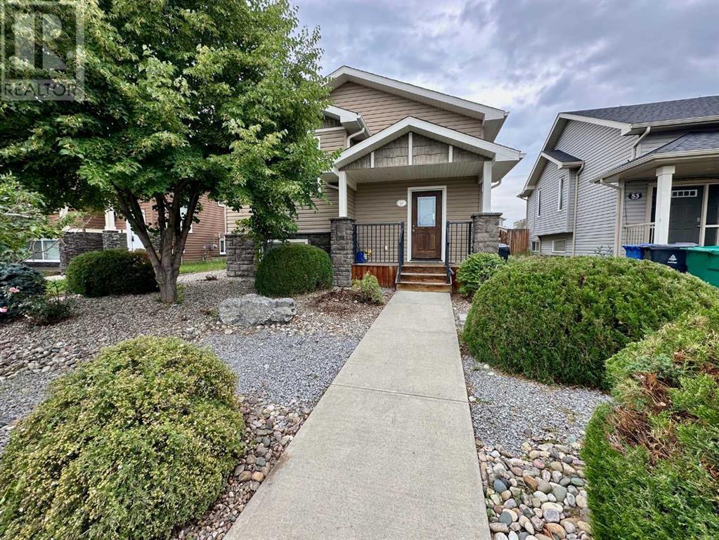 57 Mt Sundance Road W, Lethbridge, Alberta  T1J 0B6 - Photo 2 - A2240187