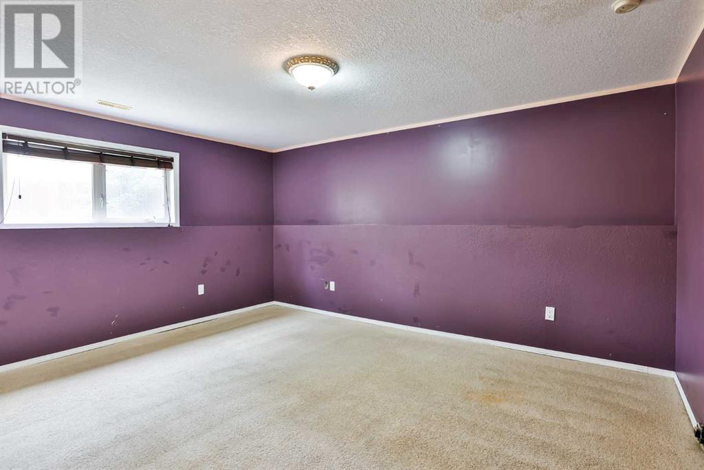 63 Mt Alderson Crescent W, Lethbridge, Alberta  T1K 6P2 - Photo 20 - A2238690