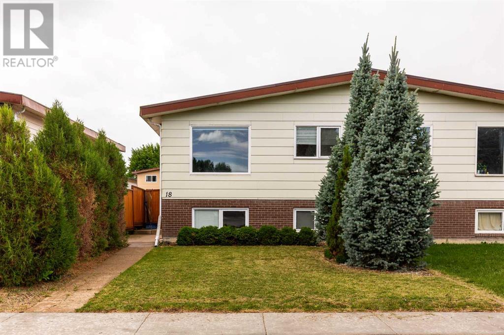 18 Cayuga Crescent W, Lethbridge, Alberta  T1K 5H5 - Photo 1 - A2239419