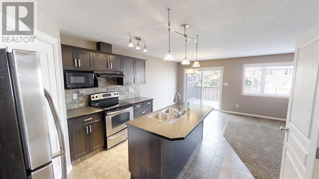 715 Silkstone Close W, Lethbridge, Alberta  T1J 4B9 - Photo 3 - A2240228