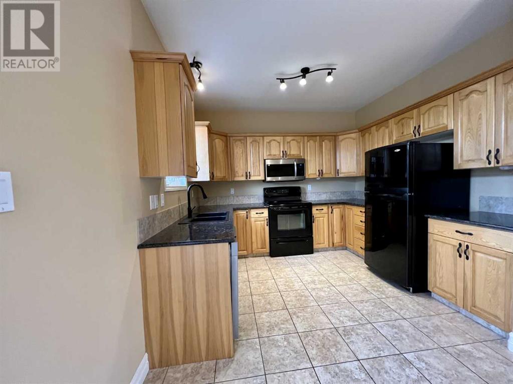 5, 762 Heritage Boulevard W, Lethbridge, Alberta  T1K 0W1 - Photo 6 - A2242231