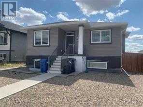 1, 1042 Alice Birch Point N, Lethbridge, Alberta  T1H 7B9 - Photo 1 - A2242340