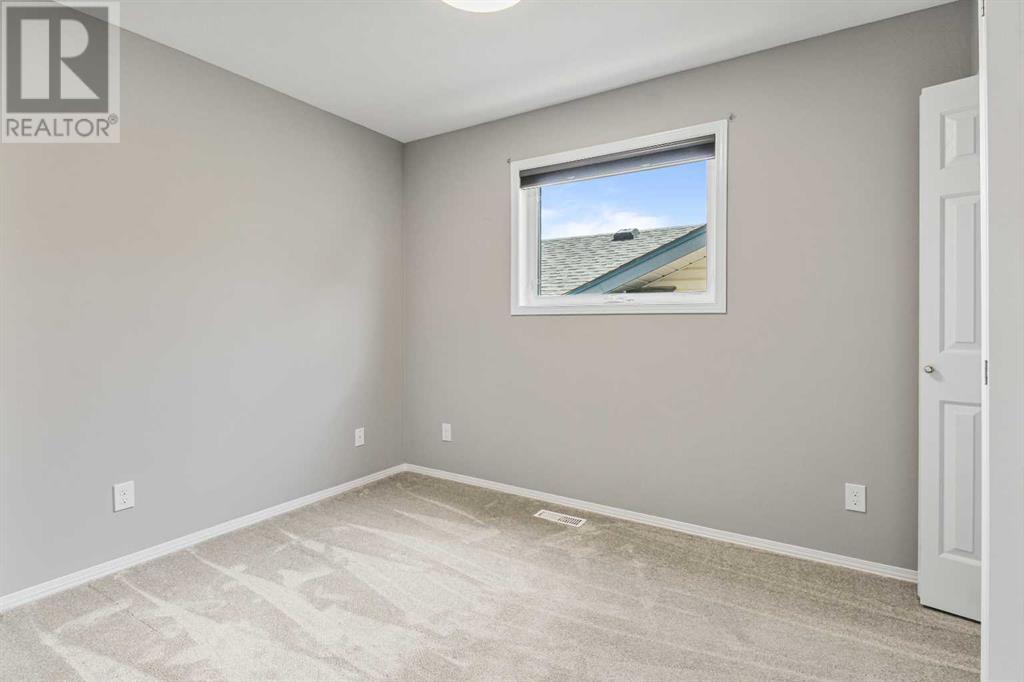 727 Heritage Boulevard W, Lethbridge, Alberta  T1K 7E6 - Photo 11 - A2241754