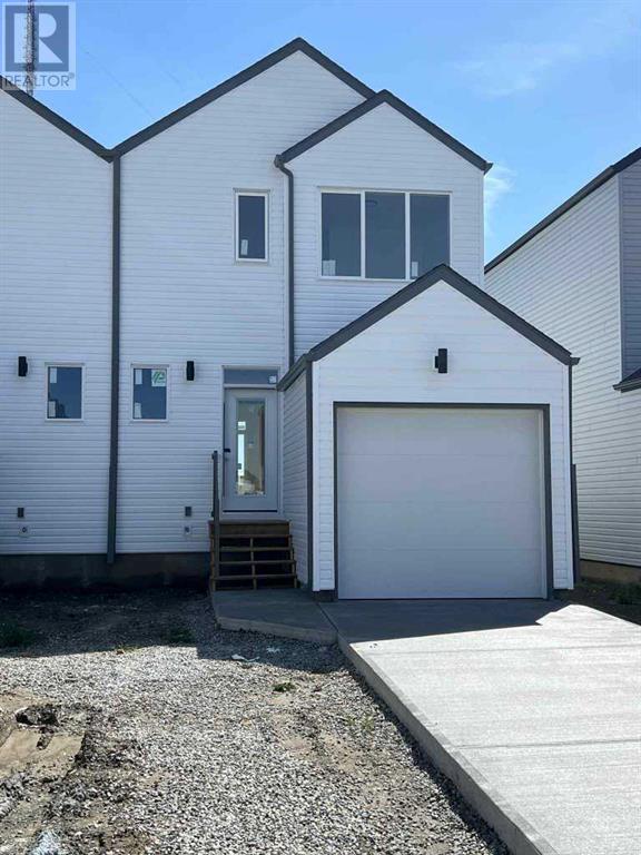 681 Blackwolf Boulevard N, Lethbridge, Alberta  T1H 7H7 - Photo 2 - A2223596