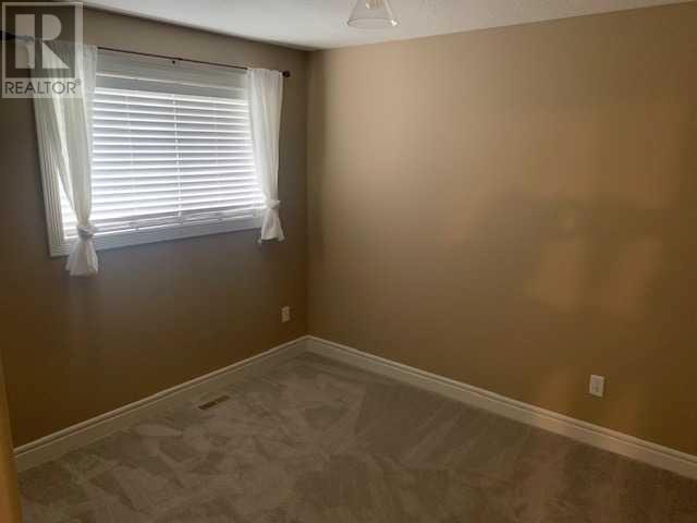 1, 893 Mount Sundance Manor W, Lethbridge, Alberta  T1J 1X5 - Photo 15 - A2243874