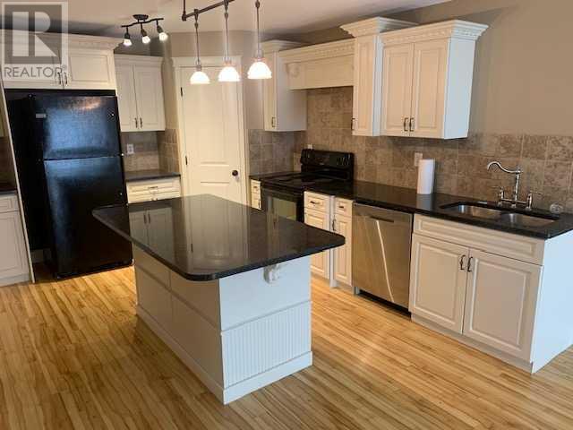 1, 893 Mount Sundance Manor W, Lethbridge, Alberta  T1J 1X5 - Photo 8 - A2243874