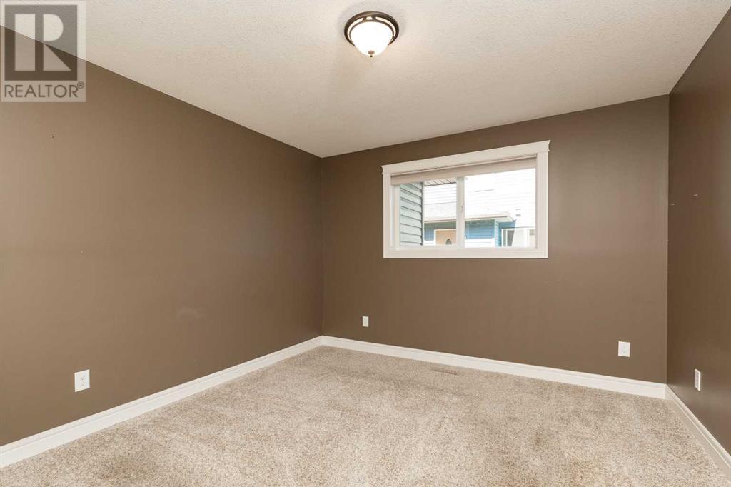 3, 895 Mt Sundance Manor W, Lethbridge, Alberta  T1J 1X7 - Photo 15 - A2243724