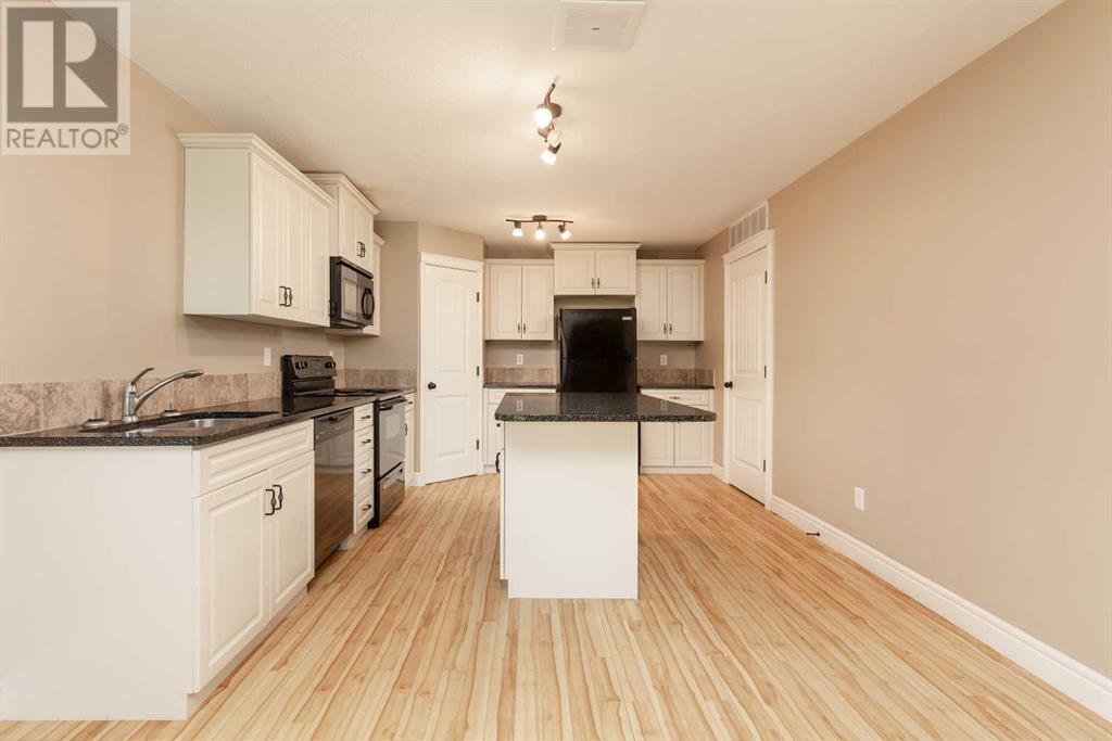 3, 895 Mt Sundance Manor W, Lethbridge, Alberta  T1J 1X7 - Photo 8 - A2243724
