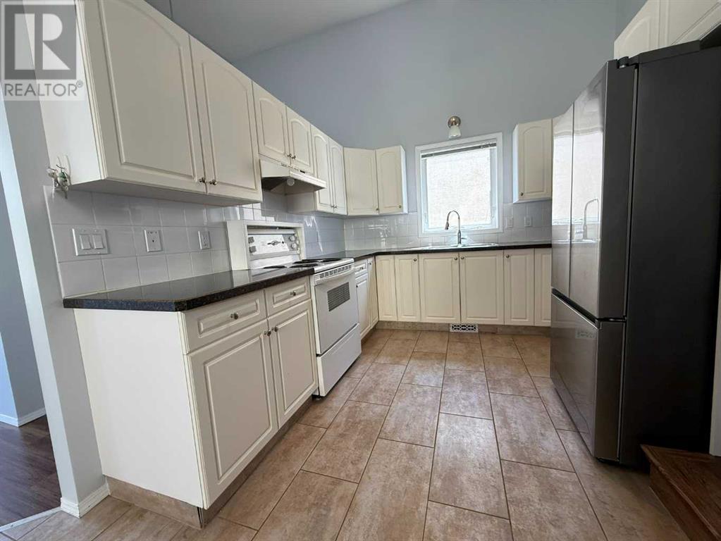86 Assiniboia Way W, Lethbridge, Alberta  T1K 6X3 - Photo 4 - A2244067