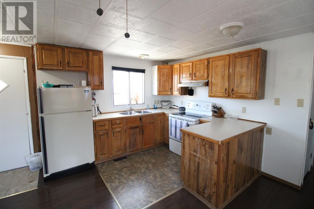 6225 48 St, Taber, Alberta  T1G 1J3 - Photo 2 - A2244411
